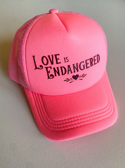 Love is Endangered Trucker Hat
